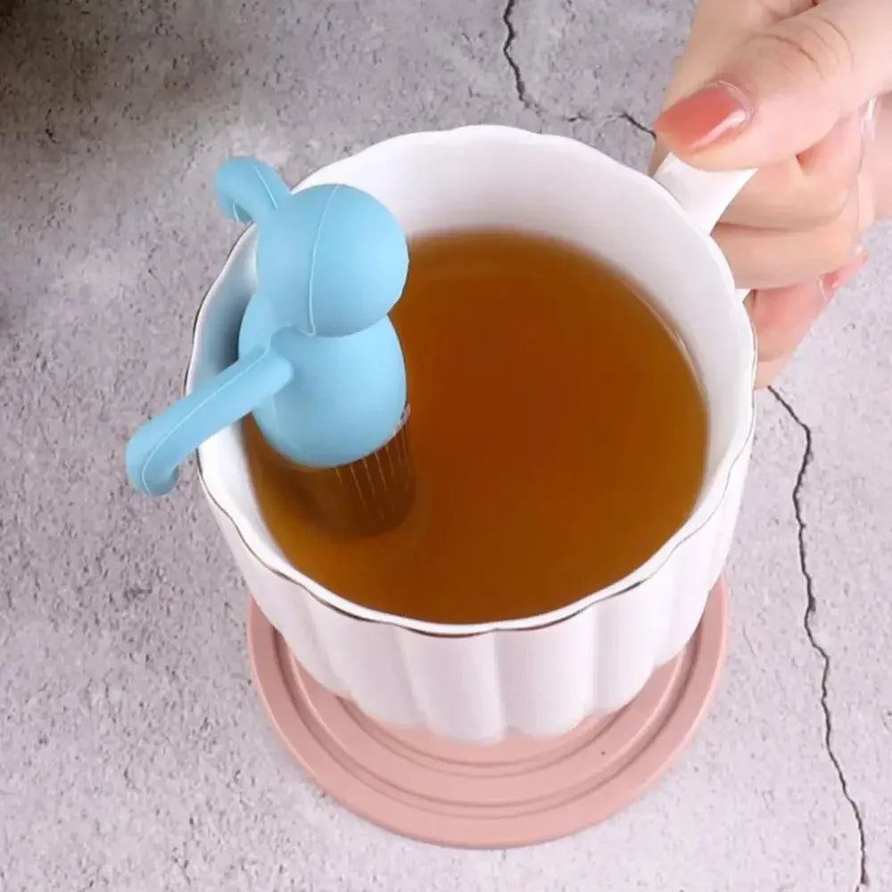 Infusor de té de acero, muñeco